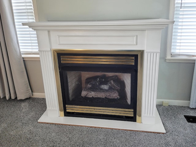 107 Timberlake Ave, Erlanger, KY 41018 - detailed view of a fireplace, baseboards, and carpet floors