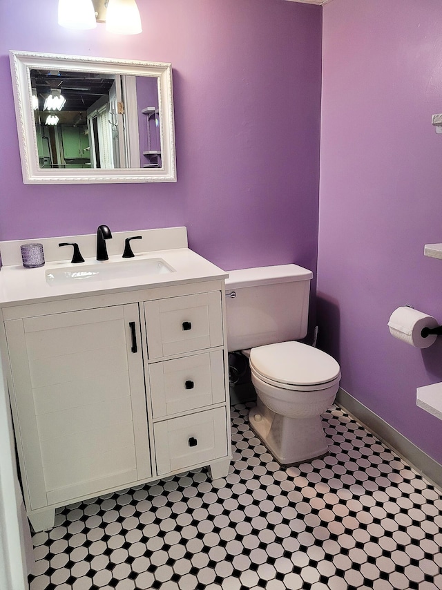 107 Timberlake Ave, Erlanger, KY 41018 - bathroom with toilet, vanity, tile patterned flooring, and baseboards