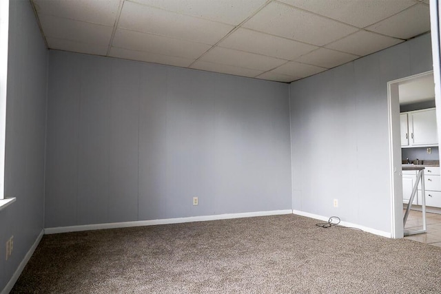 408 Florence Ct, Elsmere, KY 41018 - carpeted empty room featuring a drop ceiling and baseboards