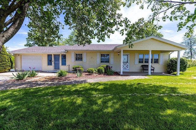 ranch-style home with a front lawn, an attached garage, and covered porch