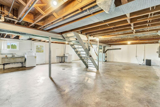 below grade area featuring a sink and stairs