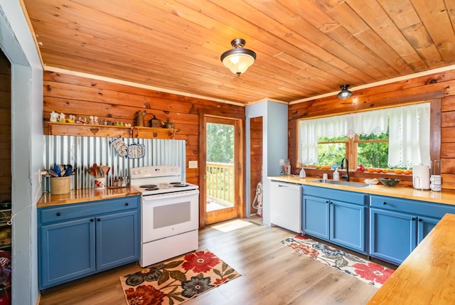 kitchen featuring white appliances, a sink, blue cabinets, wooden ceiling, and light wood-type flooring