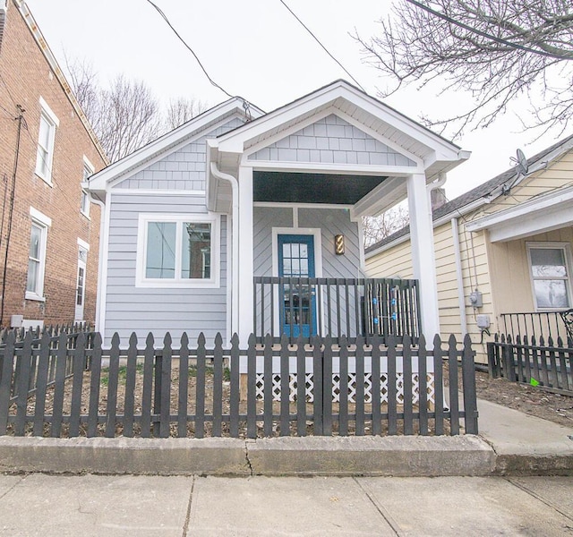 1510 Kavanaugh St, Covington, KY 41011 - view of front of home featuring covered porch and a fenced front yard