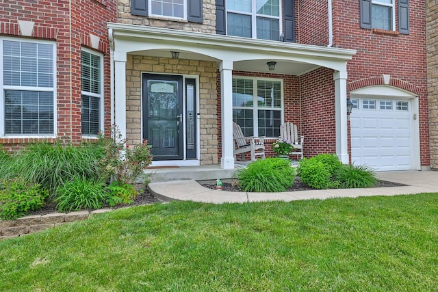2011 Holderness Dr, Union, KY 41091 - entrance to property featuring an attached garage, a lawn, brick siding, and driveway