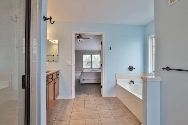 2011 Holderness Dr, Union, KY 41091 - bathroom featuring a ceiling fan, a shower stall, tile patterned flooring, vanity, and ensuite bathroom