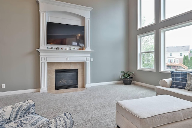 2011 Holderness Dr, Union, KY 41091 - carpeted living area with baseboards and a tiled fireplace