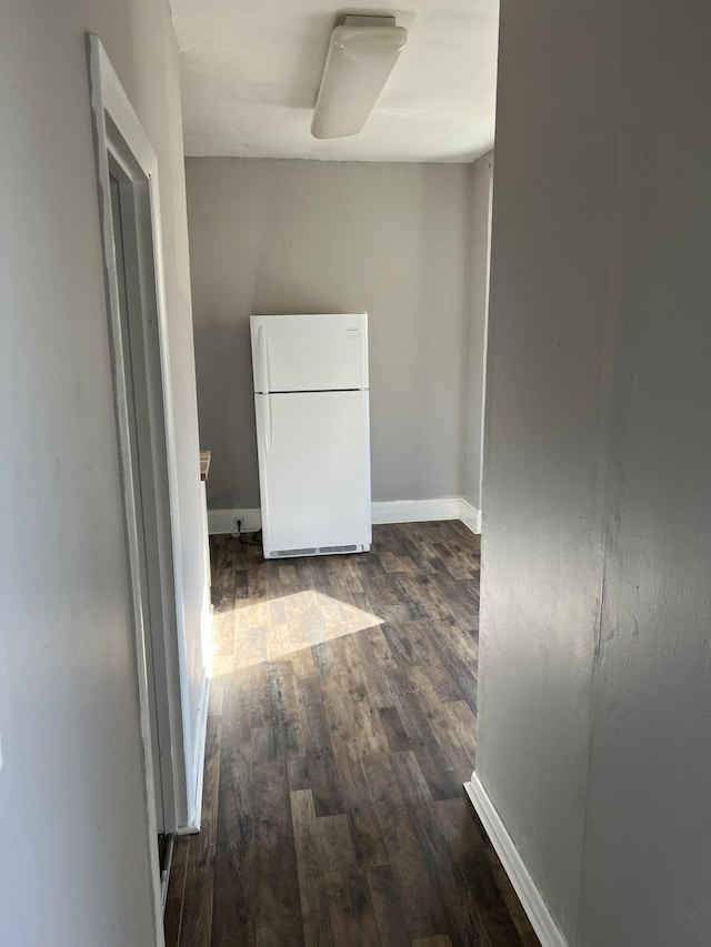 417 W 19th St, Covington, KY 41014 - hallway with dark wood finished floors and baseboards
