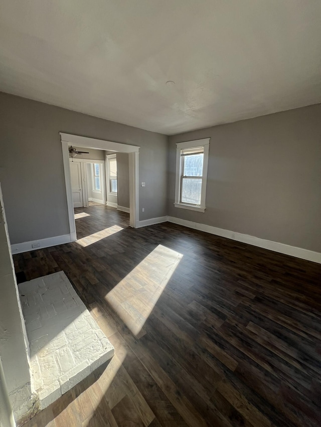 417 W 19th St, Covington, KY 41014 - unfurnished room featuring baseboards, dark wood-style floors, and ceiling fan