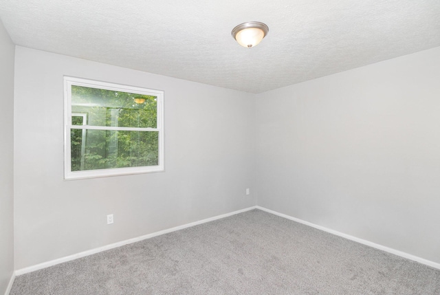 3492 Ridgewood Dr, Erlanger, KY 41018 - spare room featuring carpet floors, a textured ceiling, and baseboards