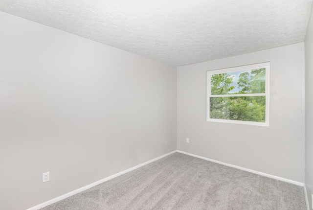 3492 Ridgewood Dr, Erlanger, KY 41018 - spare room featuring a textured ceiling, carpet floors, and baseboards