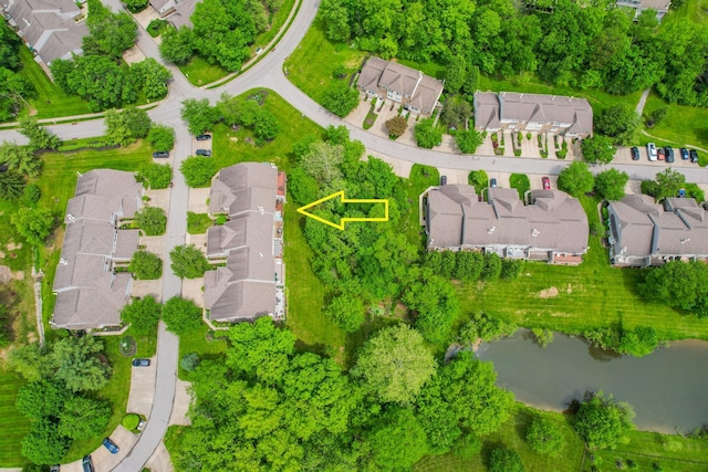 aerial perspective of suburban area featuring a large body of water