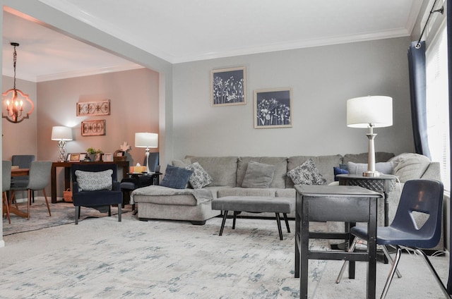 living room featuring a chandelier and ornamental molding