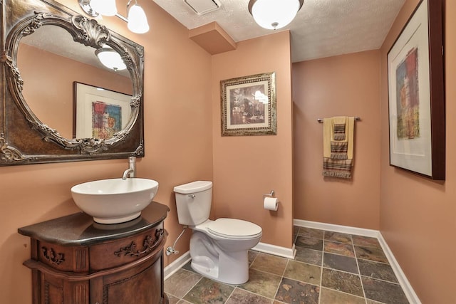 9015 Washington Trace Rd, California, KY 41007 - half bathroom with a textured ceiling, stone tile flooring, and vanity