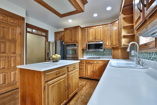 9015 Washington Trace Rd, California, KY 41007 - kitchen with stainless steel appliances, light countertops, tasteful backsplash, a kitchen island, and recessed lighting