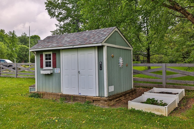 9015 Washington Trace Rd, California, KY 41007 - view of shed with a vegetable garden