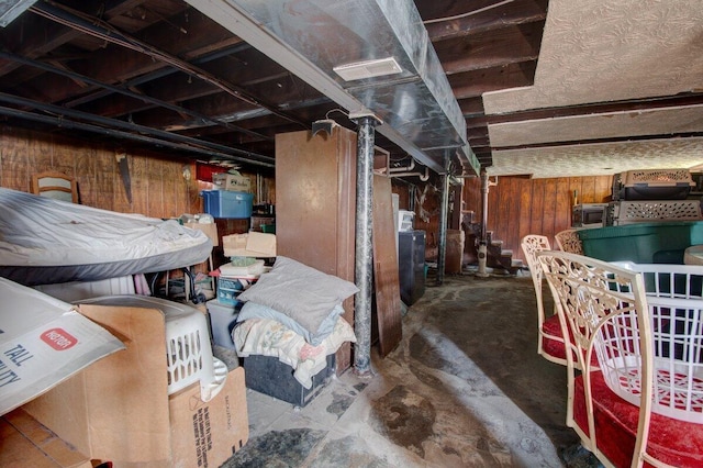 unfinished below grade area with wood walls