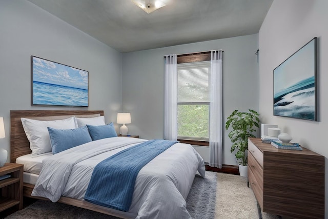 bedroom featuring baseboards