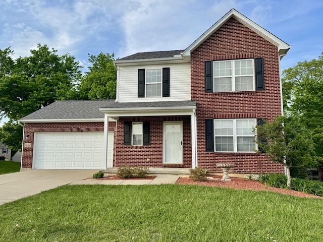 traditional-style home featuring driveway, a front yard, an attached garage, and brick siding