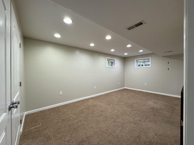 below grade area featuring recessed lighting, carpet flooring, and baseboards