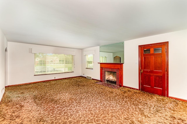 39 Buttermilk Pike, Fort Mitchell, KY 41017 - unfurnished living room with carpet, a brick fireplace, and baseboards