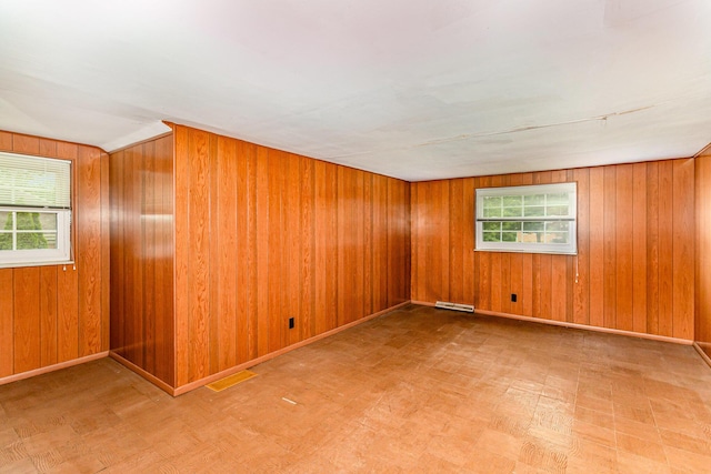 39 Buttermilk Pike, Fort Mitchell, KY 41017 - unfurnished room with tile patterned floors and wooden walls