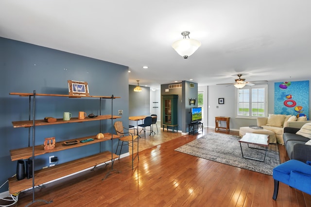 17 Harrison Ave, Bellevue, KY 41073 - living room featuring wood-type flooring, a ceiling fan, and baseboards