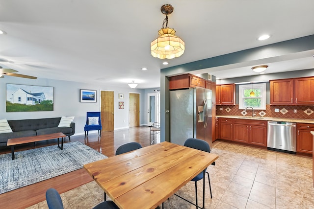 17 Harrison Ave, Bellevue, KY 41073 - dining room featuring a ceiling fan, recessed lighting, light tile patterned flooring, and baseboards