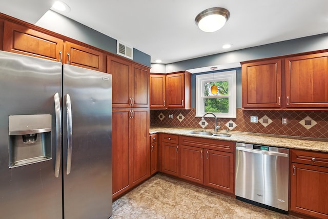 17 Harrison Ave, Bellevue, KY 41073 - kitchen featuring appliances with stainless steel finishes, a sink, backsplash, light stone countertops, and recessed lighting