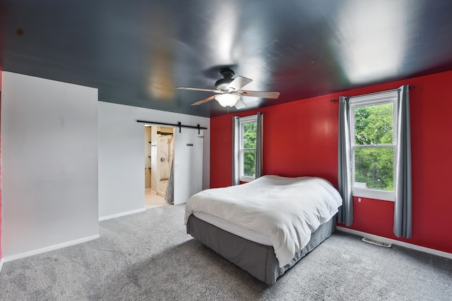 17 Harrison Ave, Bellevue, KY 41073 - bedroom featuring a barn door, multiple windows, carpet floors, and baseboards