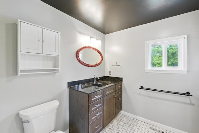 17 Harrison Ave, Bellevue, KY 41073 - half bathroom featuring vanity, toilet, and baseboards
