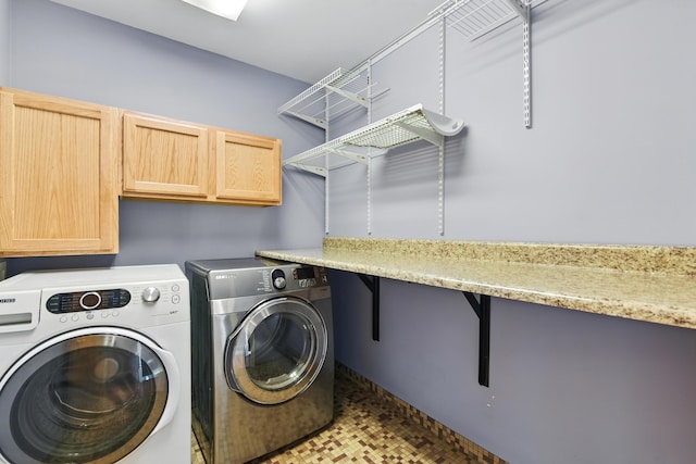 17 Harrison Ave, Bellevue, KY 41073 - washroom featuring separate washer and dryer and cabinet space