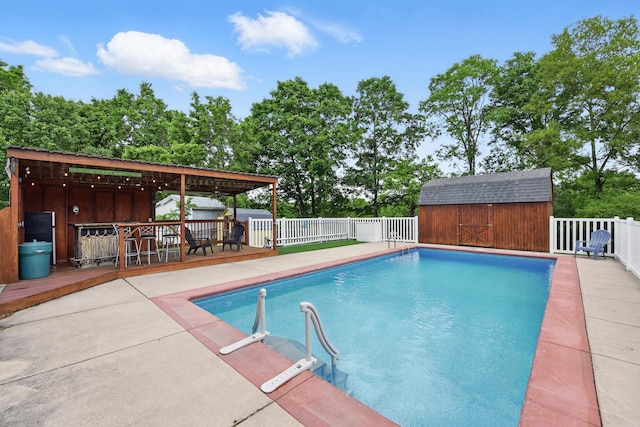 17 Harrison Ave, Bellevue, KY 41073 - view of swimming pool with an outdoor structure, a wooden deck, and a patio