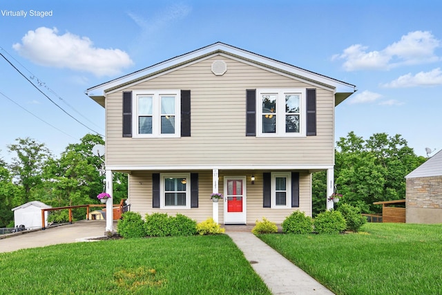 17 Harrison Ave, Bellevue, KY 41073 - view of front of house featuring covered porch and a front lawn