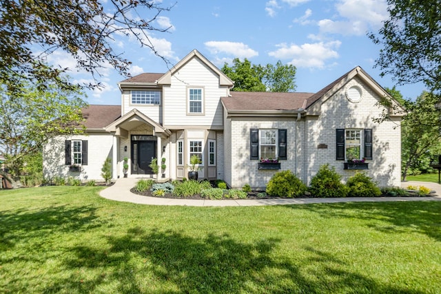 1169 Appomattox Dr, Florence, KY 41042 - traditional-style home with brick siding, a front yard, and roof with shingles