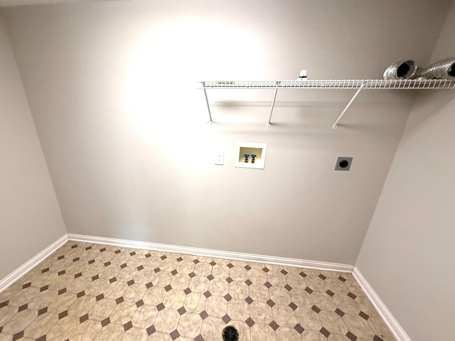 1169 Appomattox Dr, Florence, KY 41042 - laundry room with light flooring, hookup for a washing machine, electric dryer hookup, and baseboards