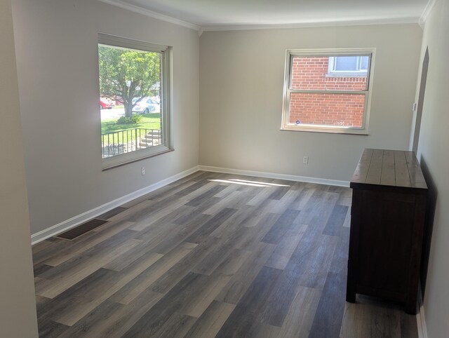 3157 Woodward St, Erlanger, KY 41018 - empty room with crown molding, dark wood-type flooring, and baseboards