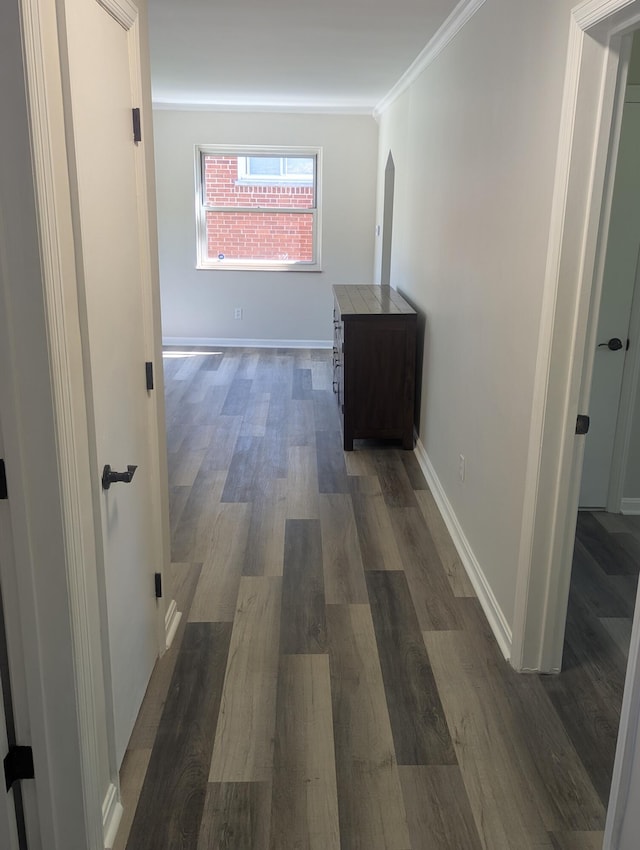 3157 Woodward St, Erlanger, KY 41018 - corridor featuring ornamental molding, arched walkways, dark wood-style floors, and baseboards