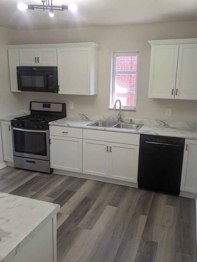 3157 Woodward St, Erlanger, KY 41018 - kitchen with black appliances, a sink, white cabinetry, and wood finished floors