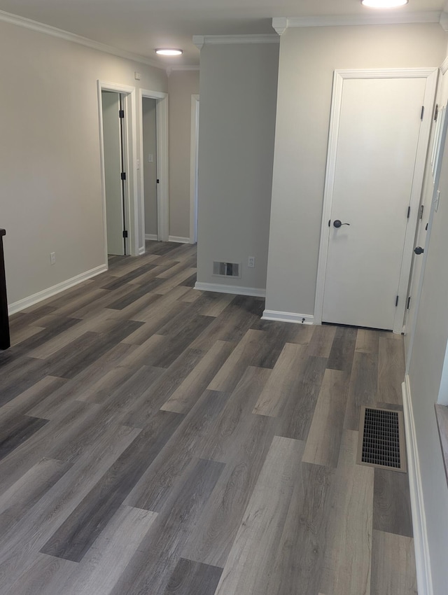 3157 Woodward St, Erlanger, KY 41018 - empty room featuring wood finished floors, ornamental molding, and baseboards
