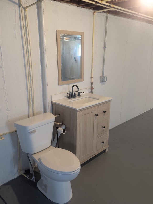 3157 Woodward St, Erlanger, KY 41018 - bathroom featuring finished concrete flooring, toilet, and vanity
