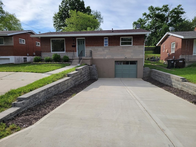 3157 Woodward St, Erlanger, KY 41018 - ranch-style house featuring a garage, driveway, stone siding, and brick siding