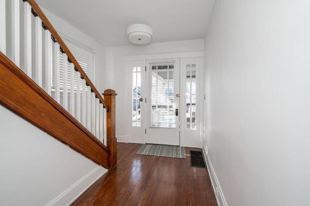2730 Dakota Ave, Covington, KY 41015 - entryway with baseboards, wood-type flooring, and stairs