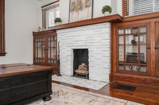 2730 Dakota Ave, Covington, KY 41015 - detailed view of a fireplace and wood finished floors