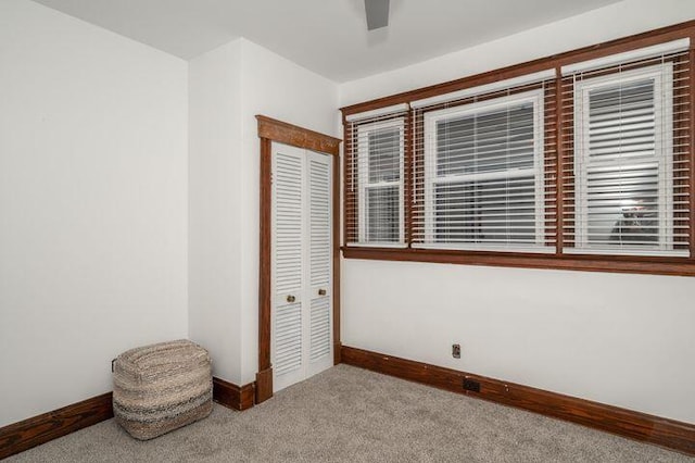 2730 Dakota Ave, Covington, KY 41015 - unfurnished bedroom featuring a closet, carpet flooring, baseboards, and a ceiling fan
