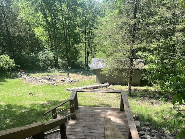 247 Hideaway, Owenton, KY 40359 - view of green lawn featuring a view of trees, a wooden deck, and an outdoor structure