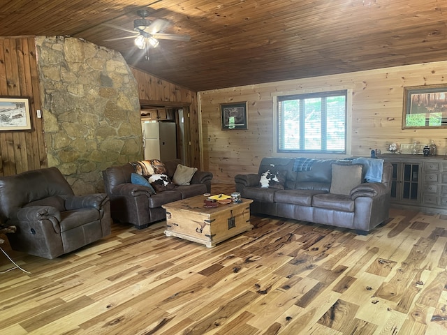 247 Hideaway, Owenton, KY 40359 - living area with vaulted ceiling, wooden walls, wood finished floors, ceiling fan, and wood ceiling