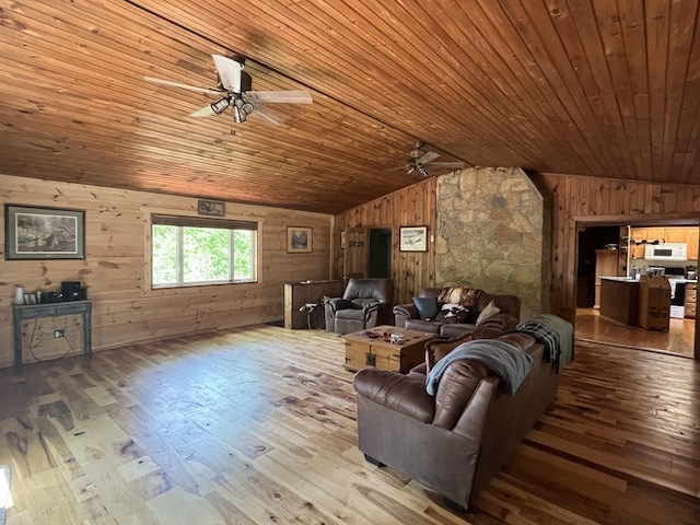 247 Hideaway, Owenton, KY 40359 - living room with a ceiling fan, lofted ceiling, hardwood / wood-style floors, wooden walls, and wood ceiling