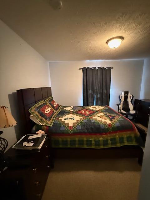 bedroom with a textured ceiling
