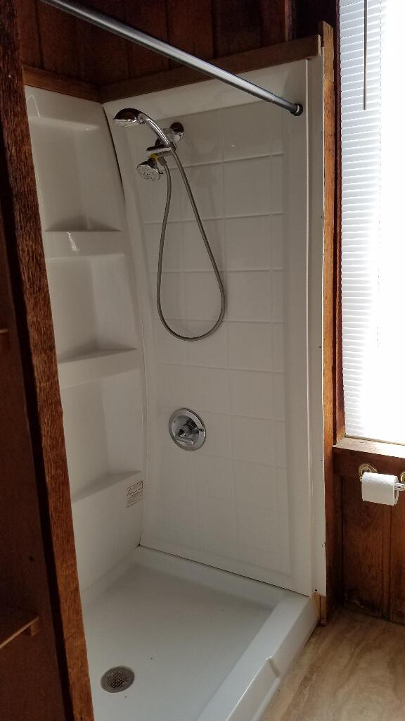 full bath featuring a stall shower