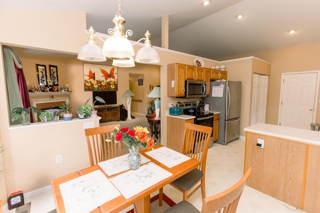 dining area featuring baseboards and recessed lighting